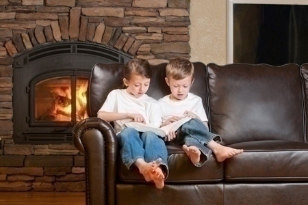 Children Reading by the Fireside