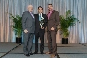 RISMedia's John Featherston with RISMedia's 2014 Tech Titan Award winner CENTURY 21 Award's David Romero, and Michael Ceparano with award sponsor Dell Services