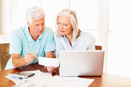 Senior Couple Calculating Home Finances