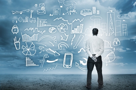 Businessman standing looking at detailed business flowchart in cloudy storm setting