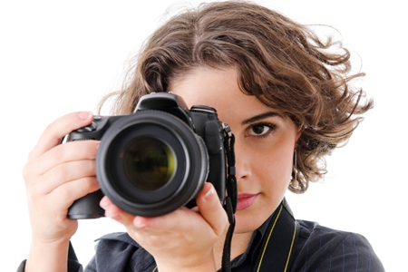 Woman photographer with camera, isolated on white