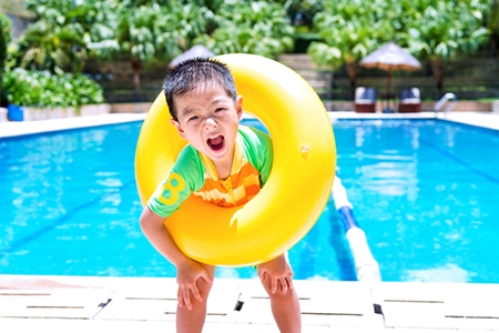 boy with swimming tube