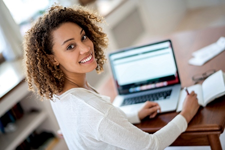 Young woman studying at home