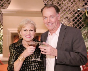 Pam O'Connor and Paul Boomsma toast the future of LeadingRE.